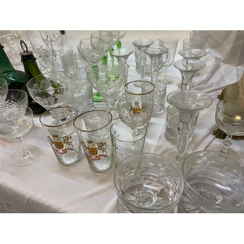 141 - A selection of glassware including sundae dishes, wines, hocks, green bottle etc..