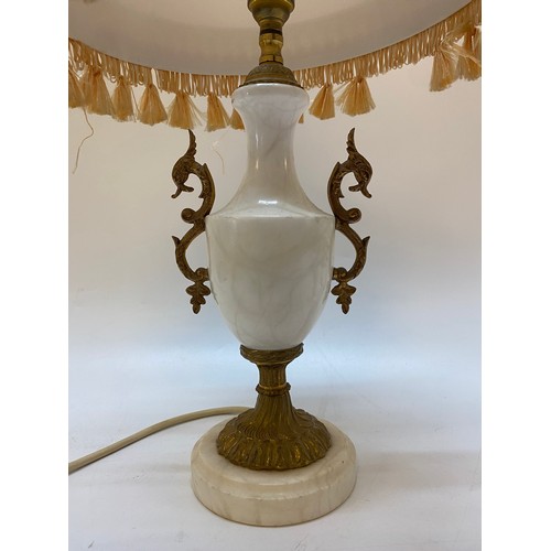 116 - An urn form tablelamp base with gilt metal mounts