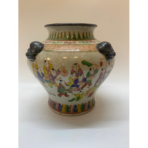 221 - A 19th Century Chinese baluster form vase decorated all round with figures in a procession, Dog of F... 