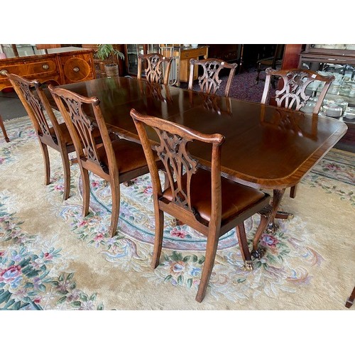 40 - A Georgian design mahogany and satinwood crossbanded dining table with rectangular top, extra centre... 