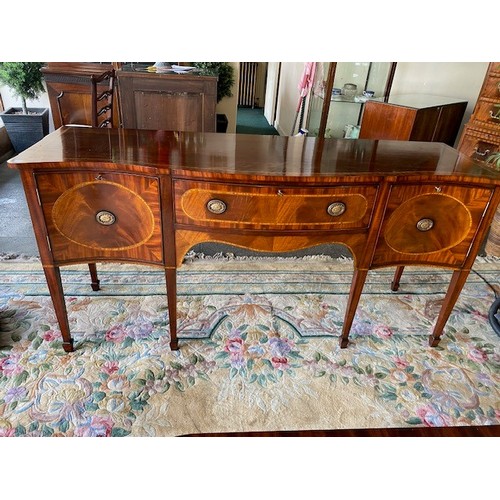 40 - A Georgian design mahogany and satinwood crossbanded dining table with rectangular top, extra centre... 