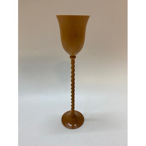 341 - Stuart Mortimer.  A turned wood goblet with barley twist stem, circular foot - 9in. high