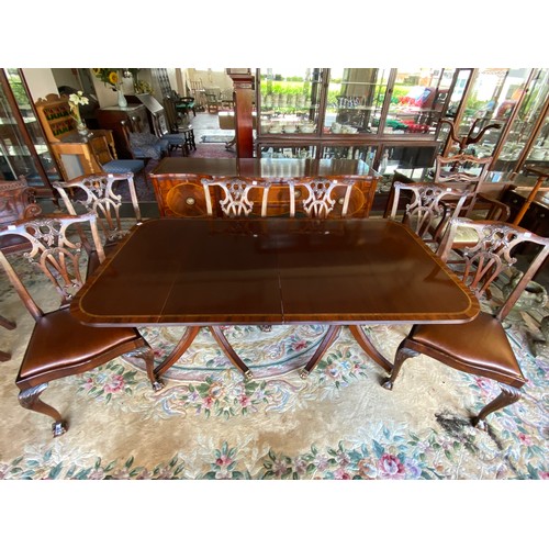 40 - A Georgian design mahogany and satinwood crossbanded dining table with rectangular top, extra centre... 