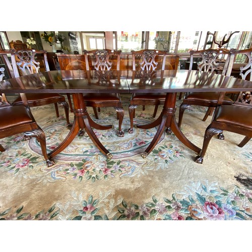 40 - A Georgian design mahogany and satinwood crossbanded dining table with rectangular top, extra centre... 