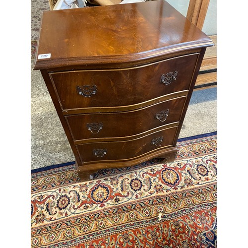 119 - A pair of reproduction mahogany chests with serpentine shaped fronts, fitted three drawers, on brack... 