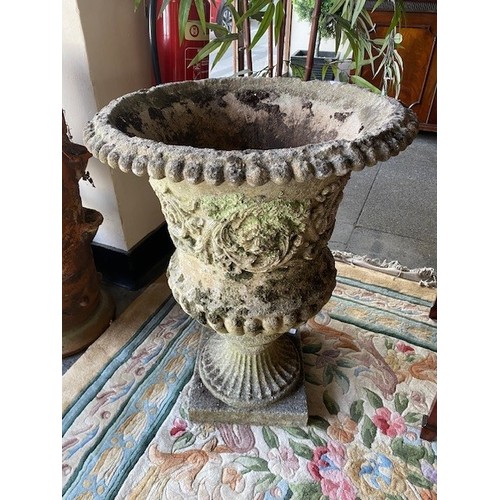 153 - A pair of large concrete garden urns with leaf scroll and nulled decoration, on square bases - 31in.... 