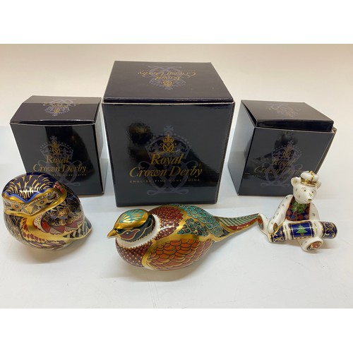102 - Three Royal Crown Derby paperweights, all boxed - Woodland Pheasant, miniature Bear Christmas Cracke... 