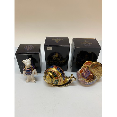 103 - Three Royal Crown Derby paperweights, all boxed - Cockerel, miniature Bear Rugby and Garden Snail (C... 