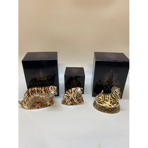 106 - Three Royal Crown Derby paperweights, all boxed - Zebra, Bengal Tiger and Bengal Tiger Cub