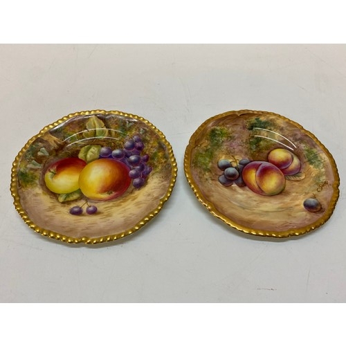 113 - Two modern Royal Worcester plates, one painted apples and grapes, signed Burke, black mark to the ba... 