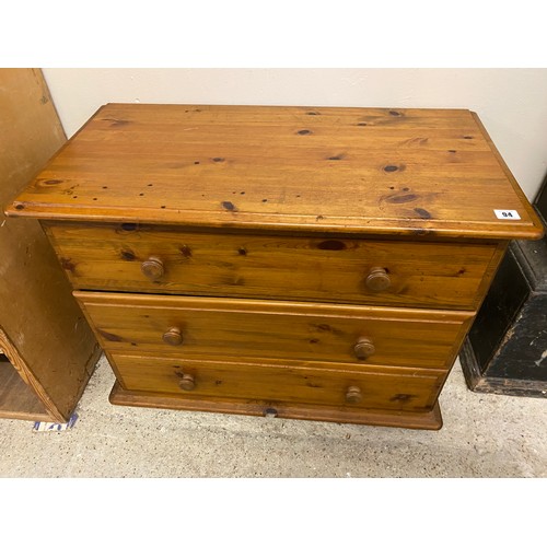 94 - A modern pine straight front chest fitted three wide drawers - 32in. wide