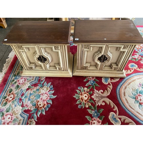 81 - A pair of cream sprayed side cabinets with oak tops - 26in. wide