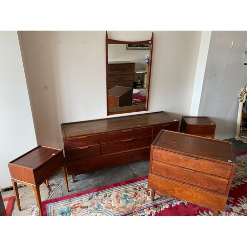 82 - A 1960's Haddon Hall walnut and teak wood grain bedroom suite comprising:- chest of three drawers - ... 