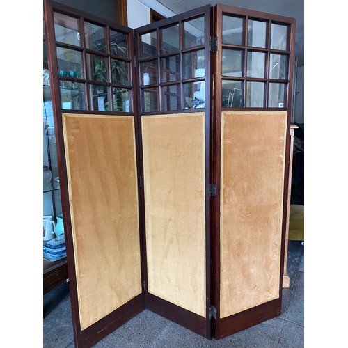 50 - An Edwardian mahogany triple folding screen with machine made tapestry and glass panels