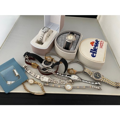 291 - A lady's Ellesse dress watch, in fitted box, a lady's Lorus wristwatch in original box, three lady's... 