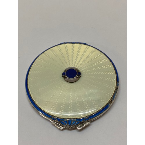 278 - A silver compact, the lid in cream guilloche enamel  and set lapis lazuli, chalcedony and marcasite ... 