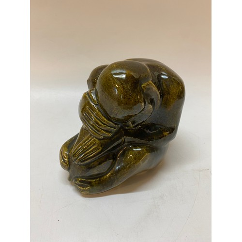 224 - A Clee Pottery green glazed model of a monkey with baby - 6 1/4in. high