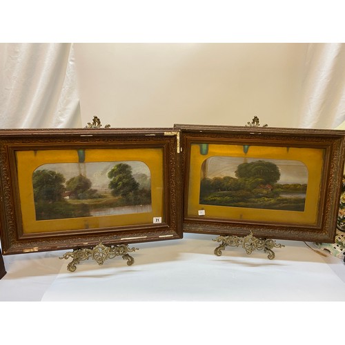 21 - A pair of oils - Lake scenes with trees and cottages, in carved wood frames and glazed - 8in. x 15 1... 