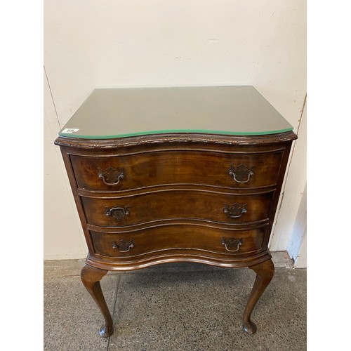 50 - A reproduction mahogany chest with serpentine front, fitted three drawers, on cabriole legs - 20in. ... 