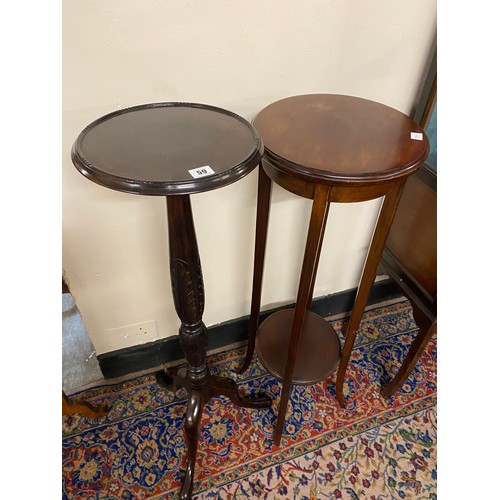 59 - Two mahogany torcheres with circular tops, turned columns, on three downswept legs terminating in cl... 