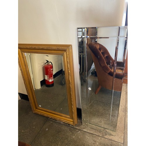 31 - A rectangular bevelled wall mirror in a gilt frame - 28in. x 41in. and a modern frameless wall mirro... 