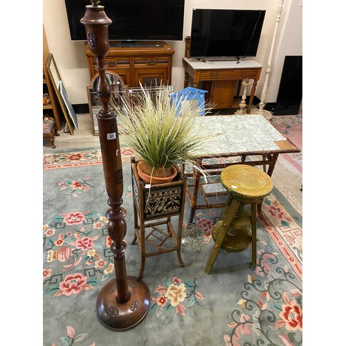 32 - A wooden stool with adjustable seat, a Kashir walnut standard lamp with carved decoration, a bamboo ... 