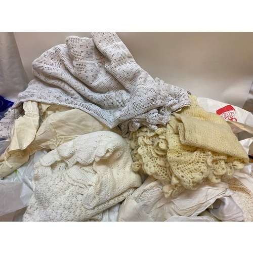 96 - A selection of linen and other including a Victorian christening gown, shawl, floral decorated fabri... 