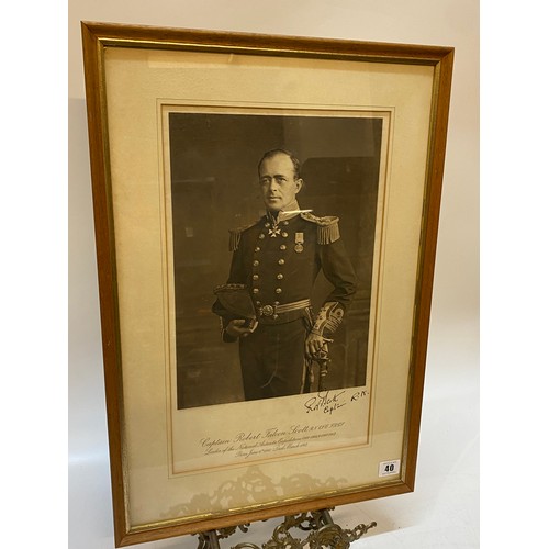 40 - A black and white photograph of Capt Robert Falcon Scott with facsimile signature, mounted, framed a... 