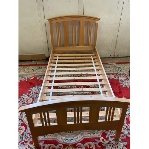 87 - A pair of light oak 3ft. bed frames