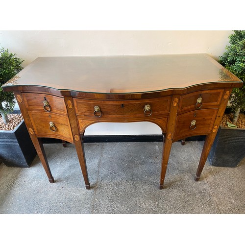 80 - A Georgian mahogany and satinwood crossbanded sideboard with serpentine shaped front, inlaid decorat... 