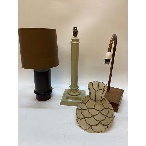 72 - A green painted wood tablelamp base with turned column, on square base, a desk lamp with shell flowe... 