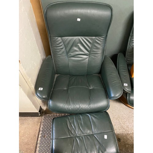 60 - A green leather Ekorness Stressless armchair and stool