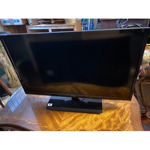 61 - A Toshiba 32in. television