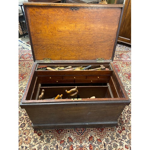 51 - A mahogany carpenters chest with rope carrying handles, fitted with a selection of hand tools includ... 