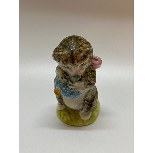 146 - A Beswick Beatrix Potter model of a cat - Miss Moppet