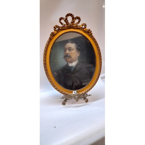 12 - A 19th Century signed pastille - Portrait of a gentleman, in a moulded gilt decorative frame and gla... 