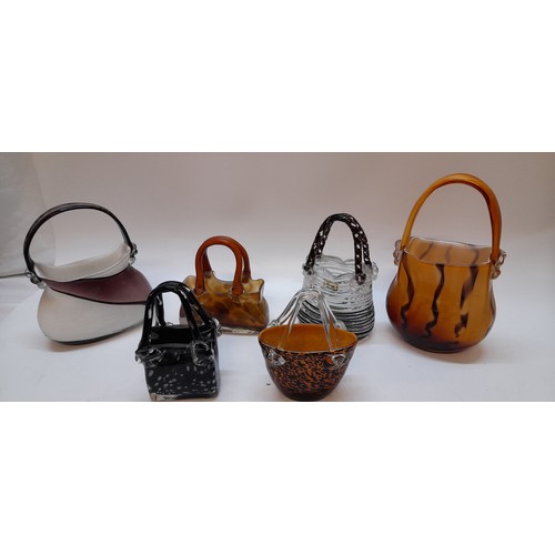 156 - A collection of coloured glass models of handbags