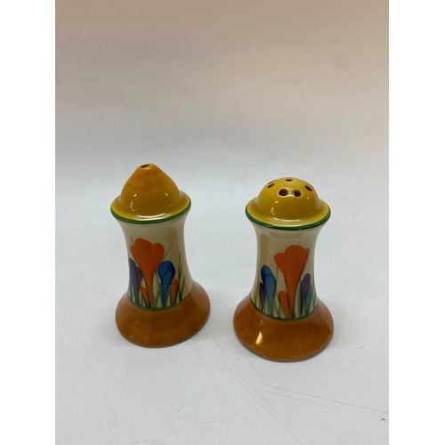 144 - A Clarice Cliff salt and pepper pot decorated crocus