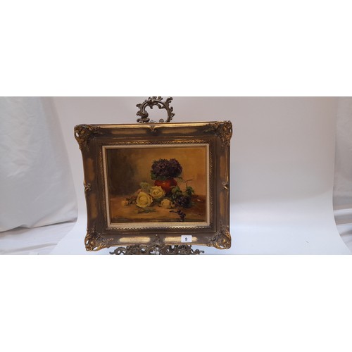 9 - A Schion.  A signed oils on board - Still life of flowers, in a gilt decorative frame - 9in. x 11in.