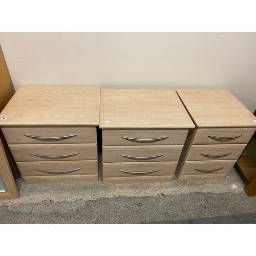 44 - Three modern limed oak veneered chests each fitted three drawers - 25in. wide and a matching mirror ... 