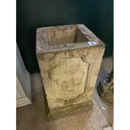 60 - Four concrete garden pots, a pedestal jardiniere with leaf decoration and two plinths