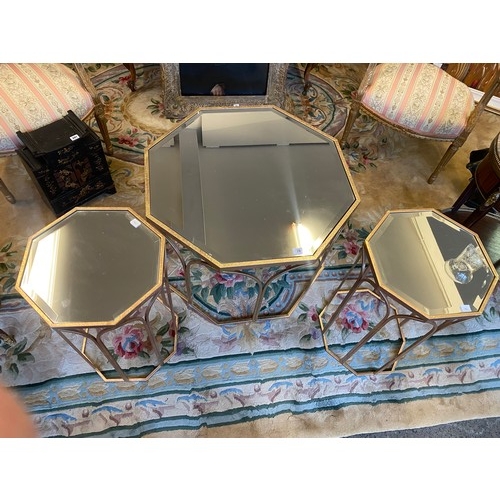 70 - A pair of gilt framed lamp tables with octagonal mirrored tops - 14in. wide and a matching coffee ta... 