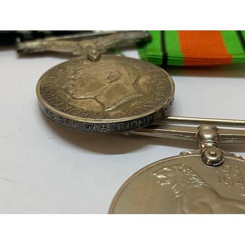 275 - A pair of Second World War medals awarded to Squadron Leader W.B Thompson and a George VI Air Effici... 