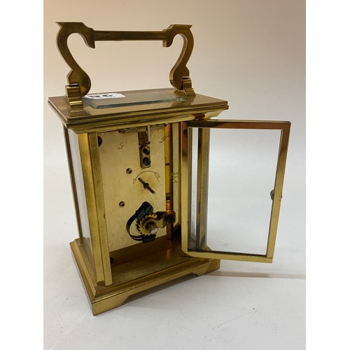 258 - A carriage clock retailed by Barnard Fries Bicester in a brass and glass case - 4 1/2in. high