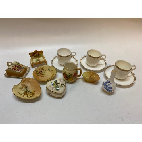 131 - A selection of Royal Worcester including a blush ivory leaf shaped trinket dish, a similar jug, a mi... 