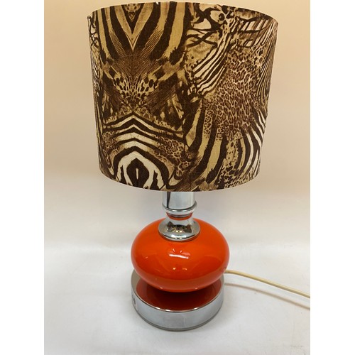 100 - A 1960's style chrome and orange glass tablelamp base complete with zebra print shade - 14 1/4in. hi... 