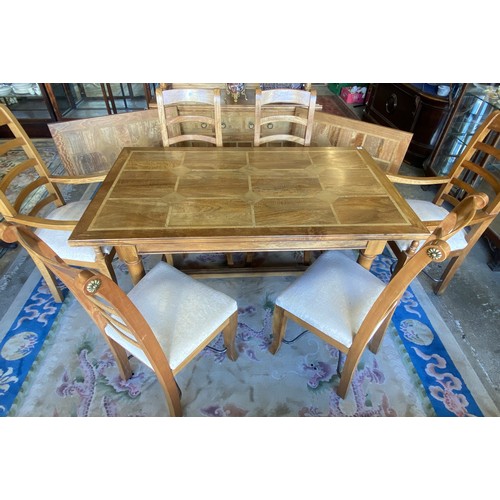 142 - A modern Baker fruitwood and flagstone inlaid drawleaf dining table on turned legs joined by an 'H' ... 