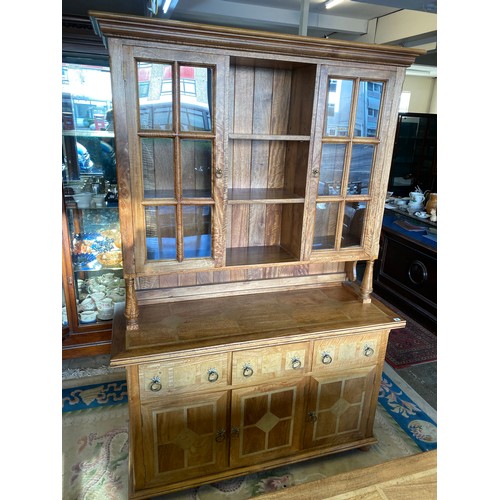 142 - A modern Baker fruitwood and flagstone inlaid drawleaf dining table on turned legs joined by an 'H' ... 