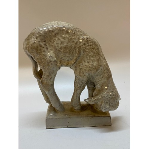 212 - A Friede Kieser Maruhn terracotta model of a grazing lamb - 9in high