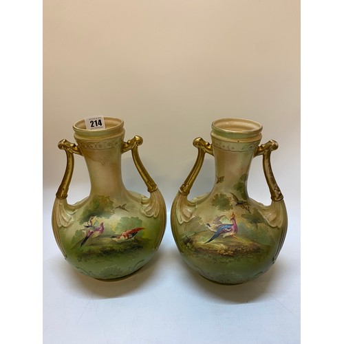 214 - A pair of Crown Devon amphora shaped vases, green ground decorated exotic birds and flowers - 11in. ... 